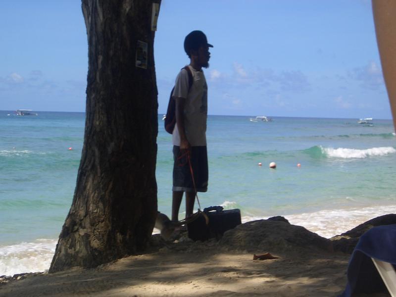 Guy with a monkey on a leash
