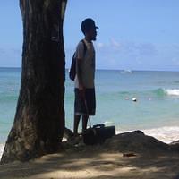 Guy with a monkey on a leash